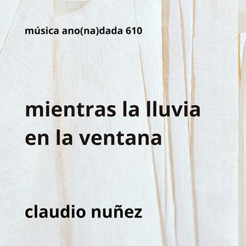 mientras la lluvia en la ventana