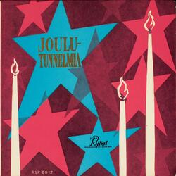 Tonttu katsoo ikkunasta