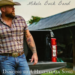 Dancing to a Heartbreak Song