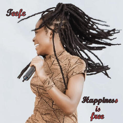 Happiness is free album art