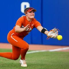 Why dogs are showing up at the College Softball World Series (Smile File) - Steve & Gina in the Morning Podcast