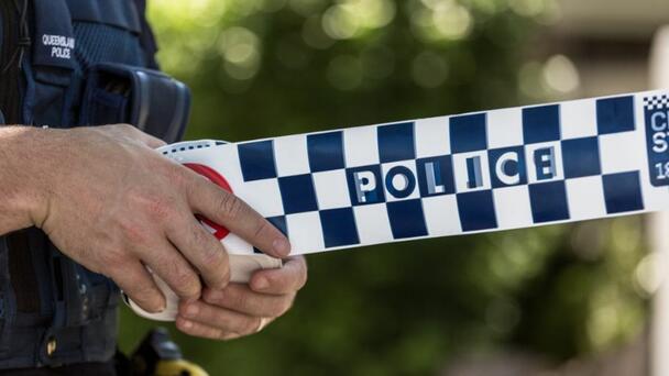 Crime scene at Mudgeeraba home after woman and dog injured in shooting