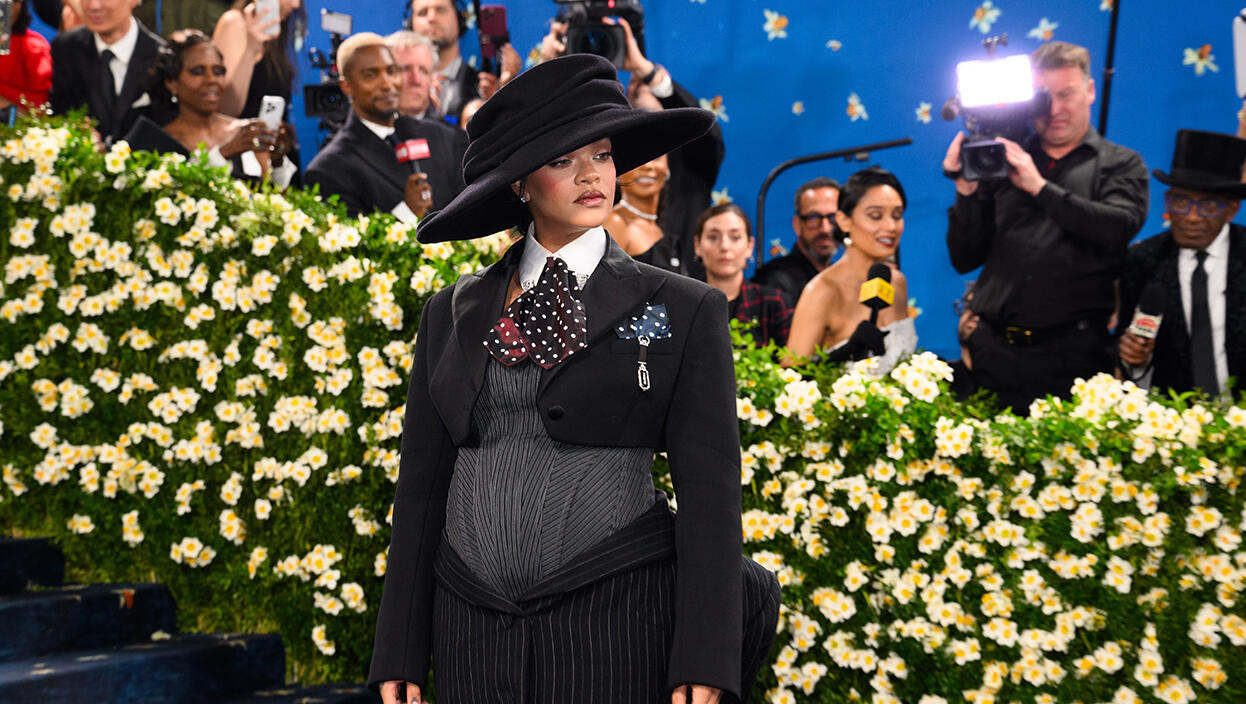 Rihanna Reveals Baby Bump At Met Gala