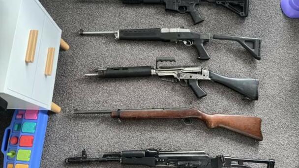 Napier man arrested after military-style guns found in children’s bedrooms