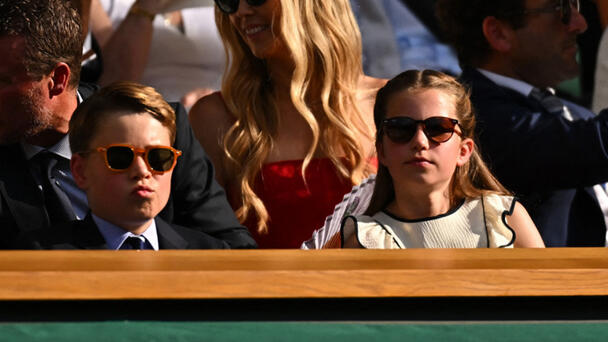 Prince George told Wimbledon doubles champions Julian Cash and Lloyd Glassp
